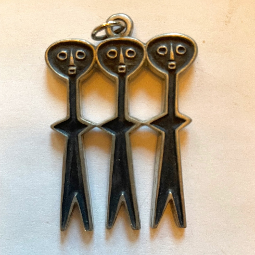 Rune Tennesmed pewter 3 people pendant/brooch
